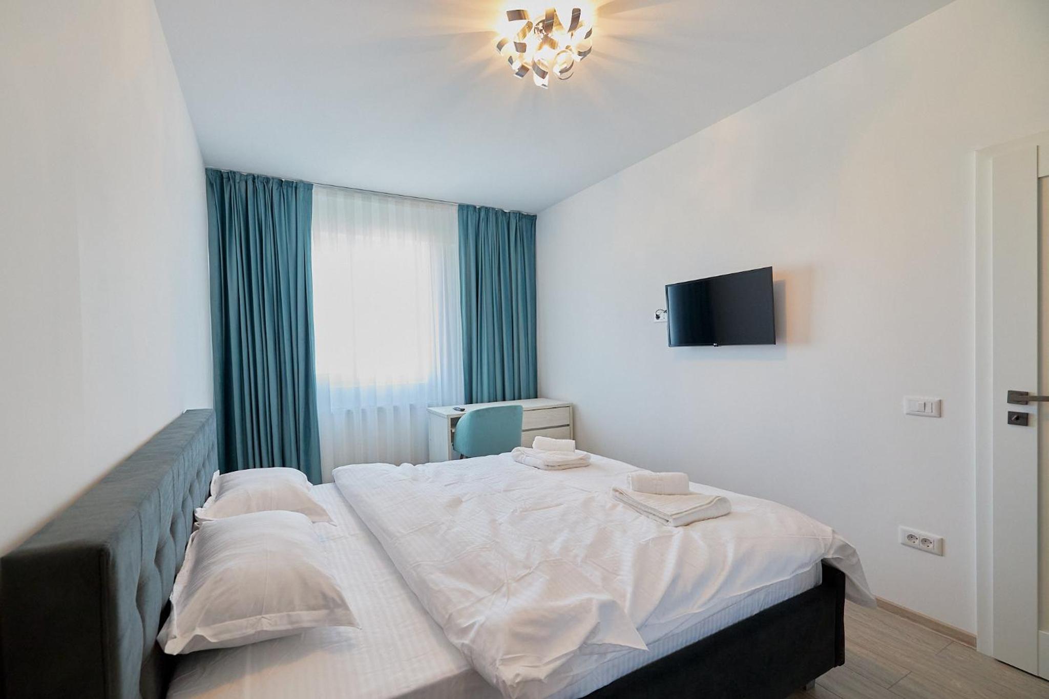 CozyCollection Apartments at Q Residence #4 view 2