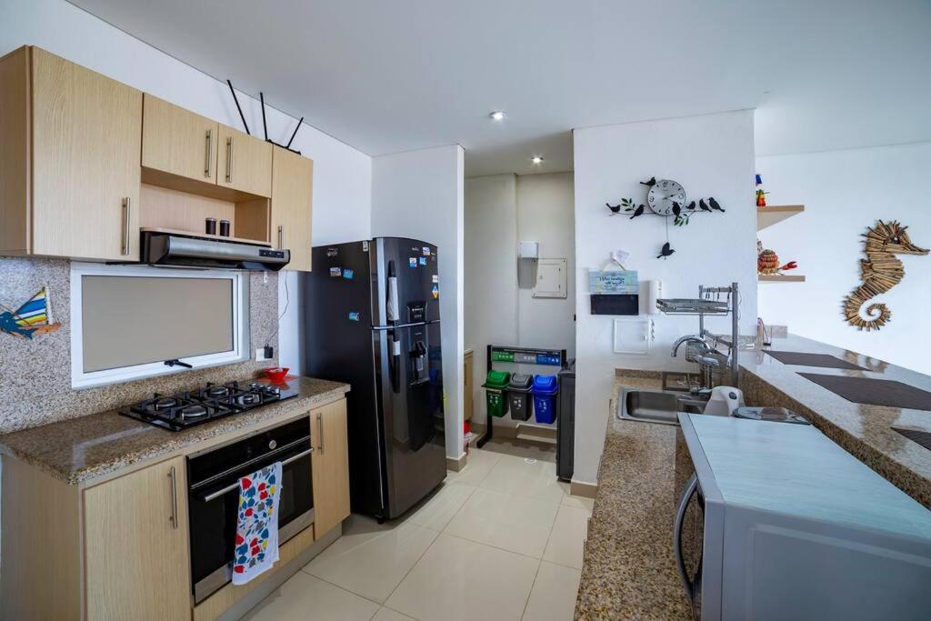 Apartamento salida directa a la playa, zona playa privada, Piscinas y jacuzzis wifi