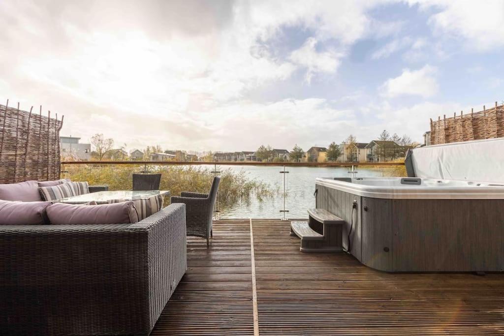 Lakeside Cotswolds Retreat with Private Hot Tub set on Lower Mill Estate view 2