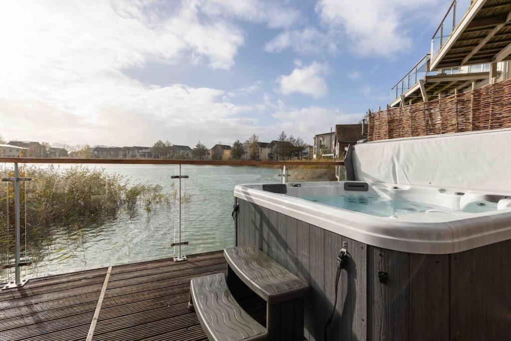 Lakeside Cotswolds Retreat with Private Hot Tub set on Lower Mill Estate view 3