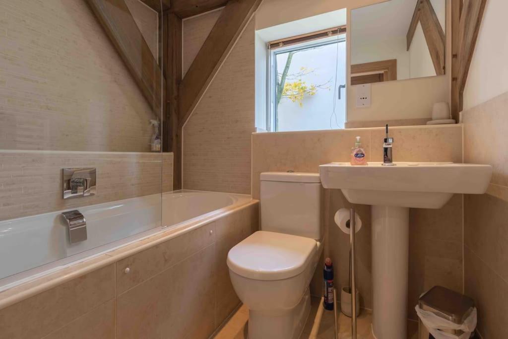 Lakeside Cotswolds Retreat with Private Hot Tub set on Lower Mill Estate view 4