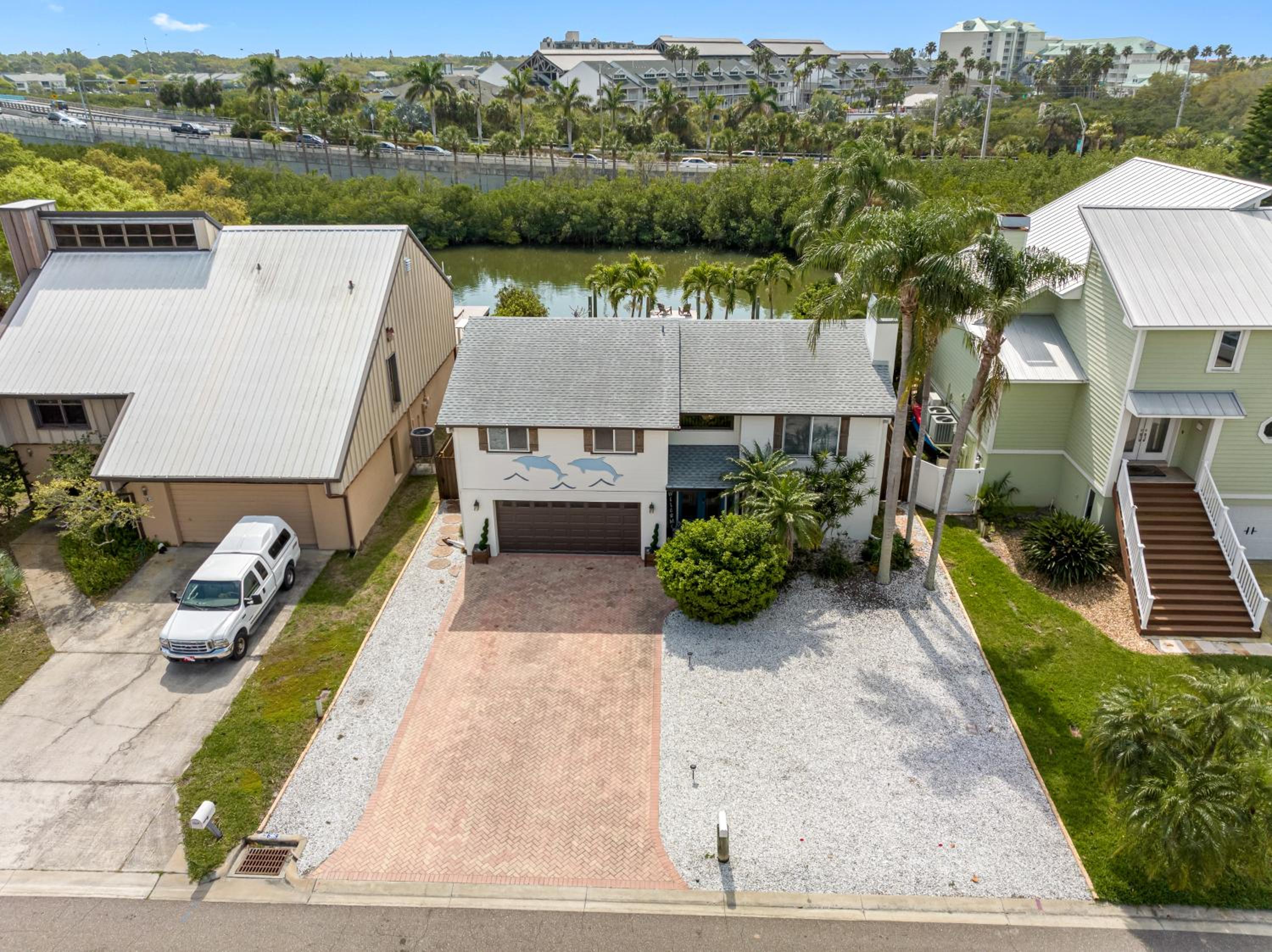 Stunning Waterfront Pool Home Walk to Beach & Restaurants Large Private Pool
