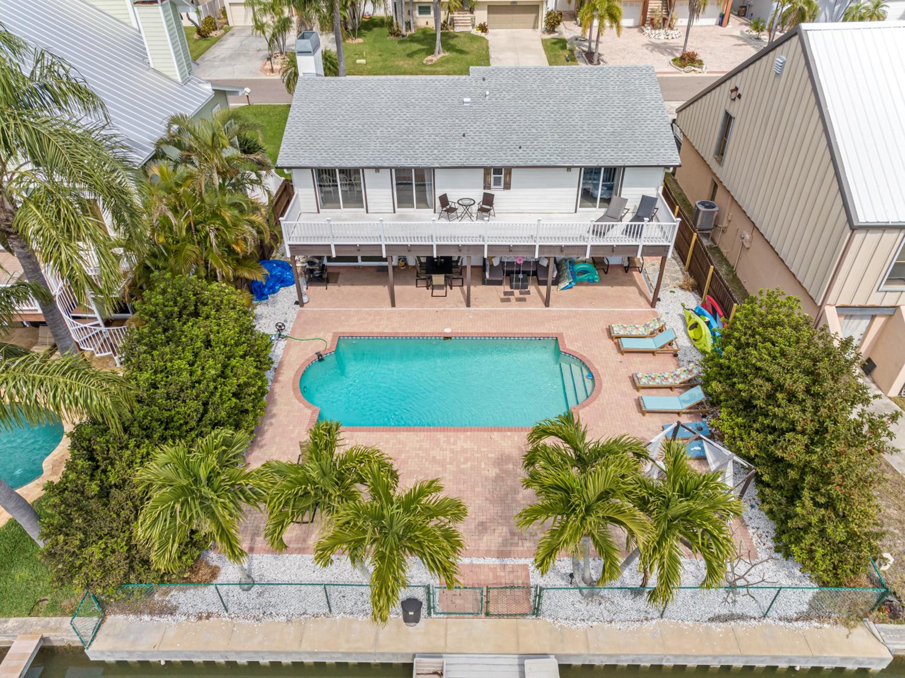 Stunning Waterfront Pool Home Walk to Beach & Restaurants Large Private Pool