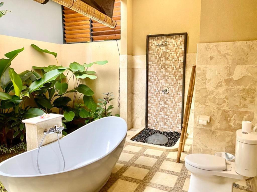 Three Brothers Bali Legian Bungalows & Villas