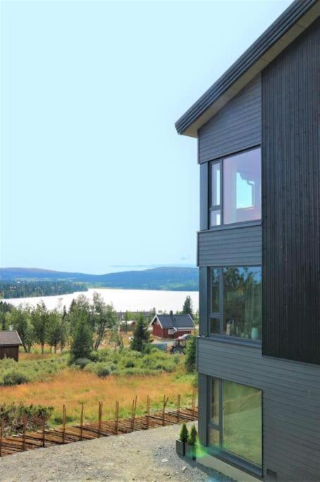 Leilighet med panoramautsikt Sjusjøen Innendørs parkering view 5