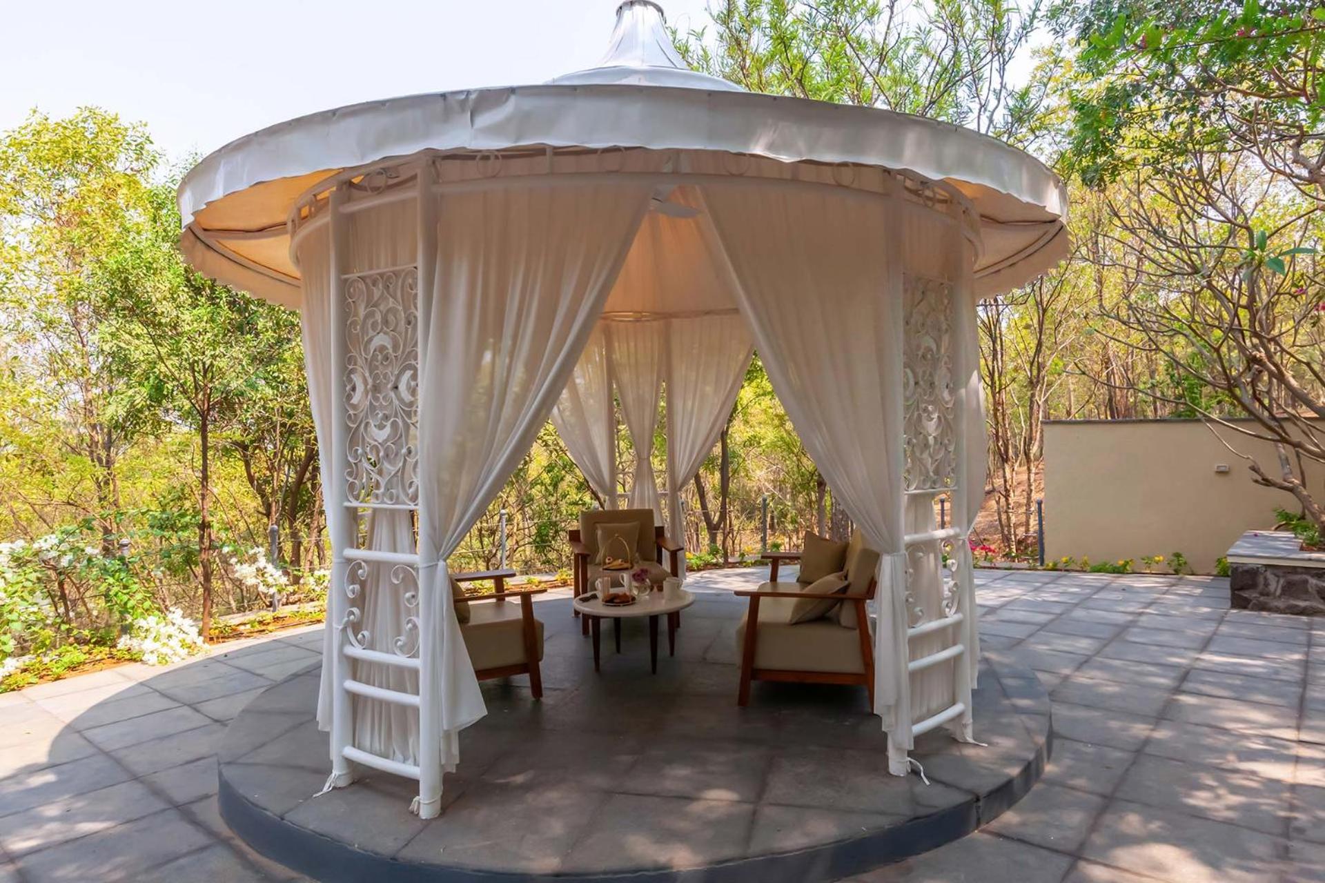 StayVista's Lush Villa - Rustic-Meets-Modern Interiors, Pool, Jacuzzi & Indoor activities view 5