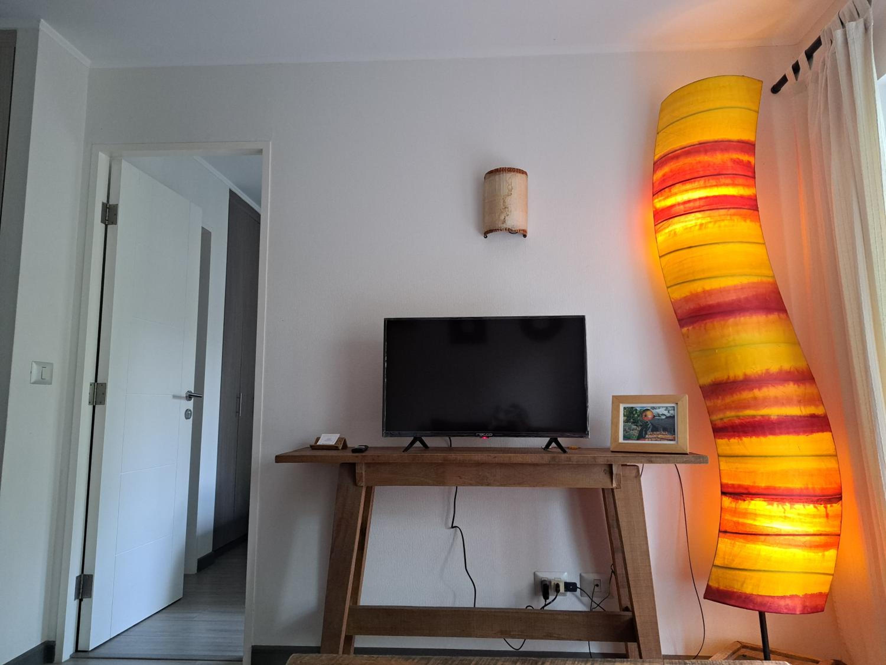Departamento boutique en entorno nativo.