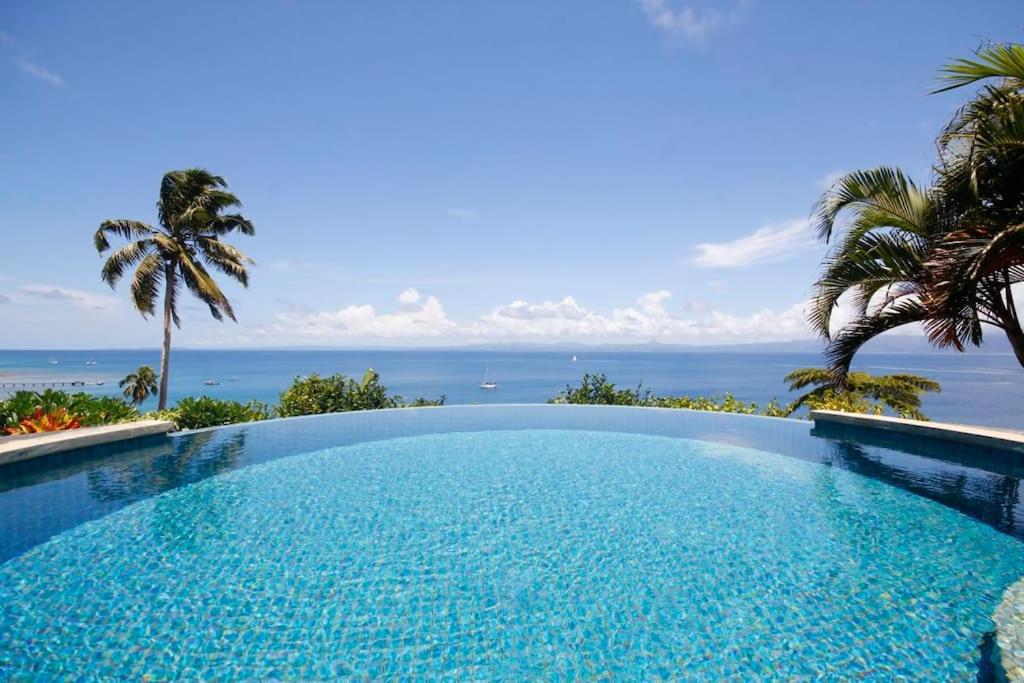 Beachfront Villa - House of Bamboo, Infinity Pool - Image 1