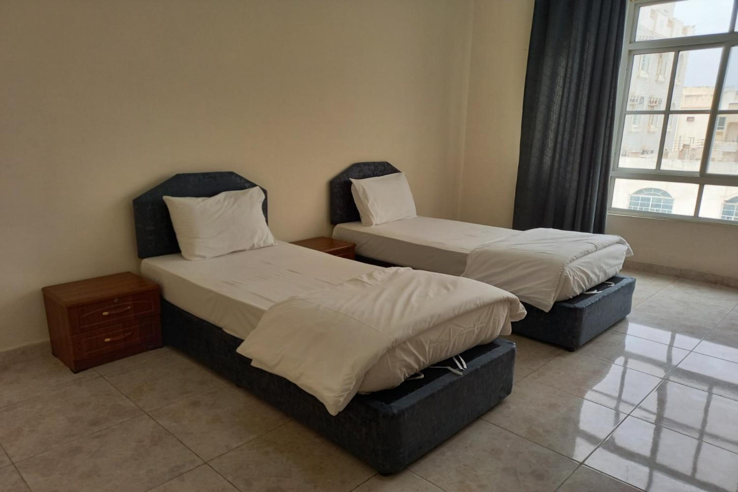 Super OYO 147 Babylon Furnished Apartment view 3