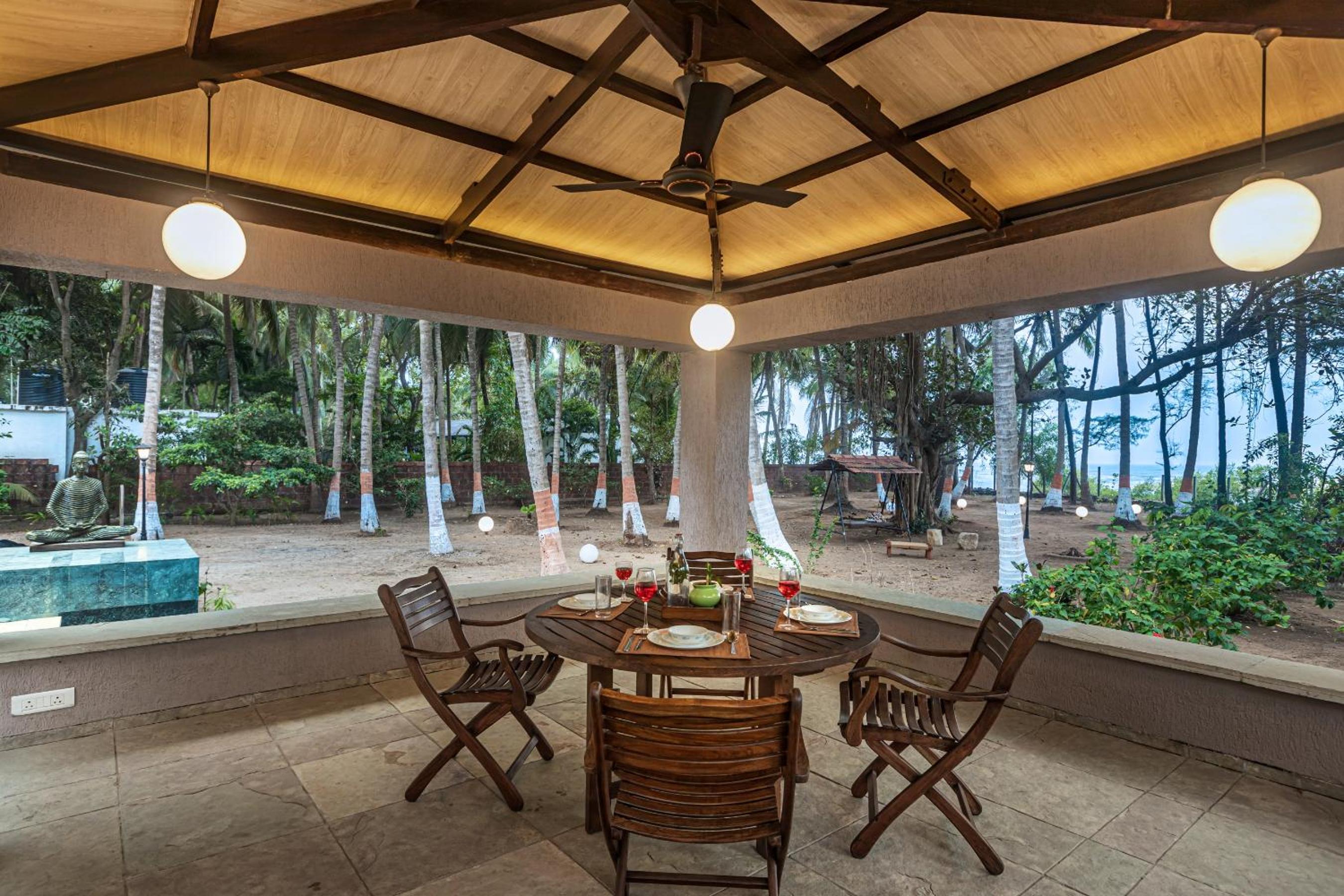 SaffronStays Bay Watch - 3BR beachfront pool villa with bonfire, gazebo & coconut grove lawns along Kelwa shoreline view 3