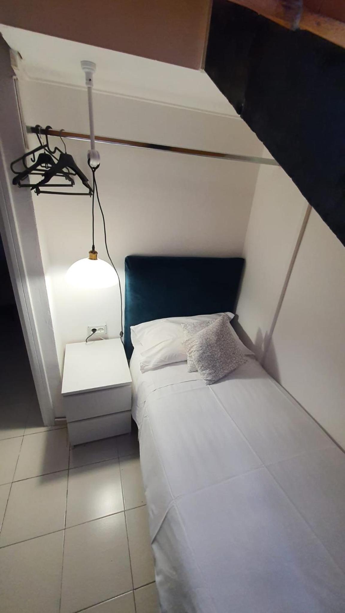 Mercanti Attic Version en Milan — hotel room