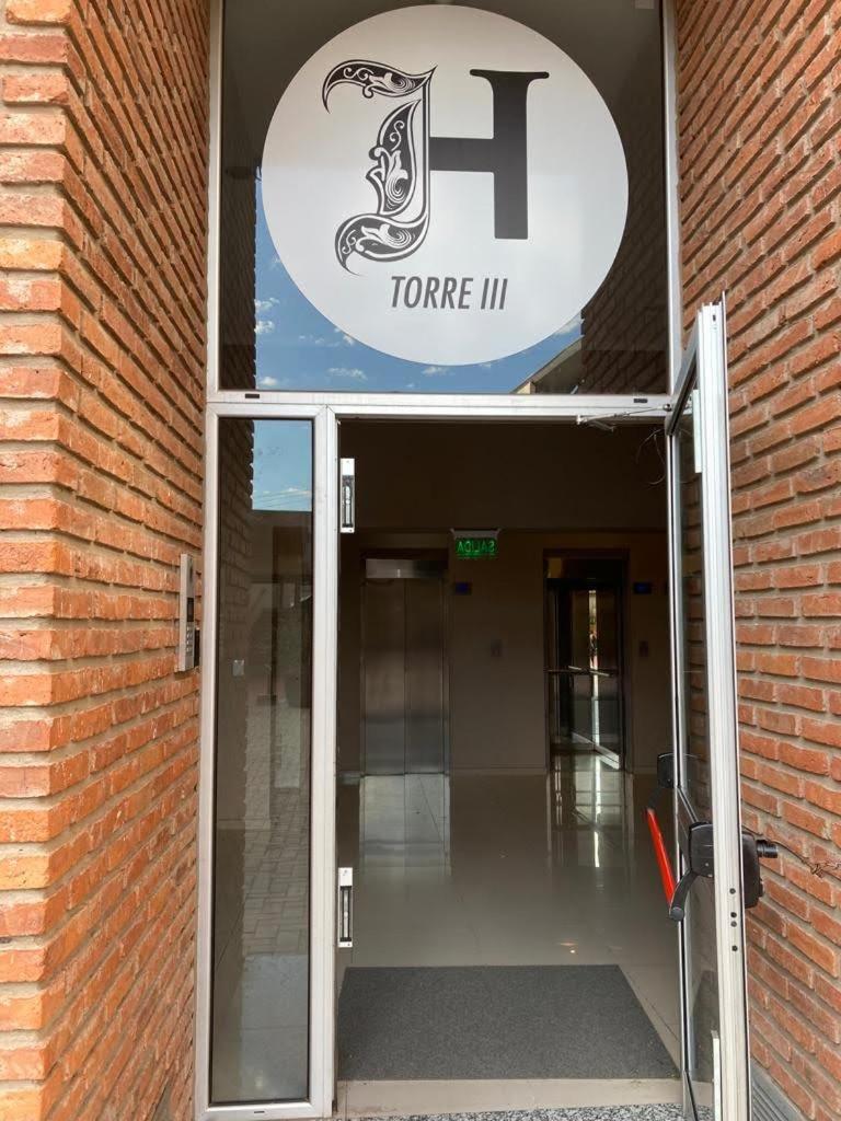 TORRES H