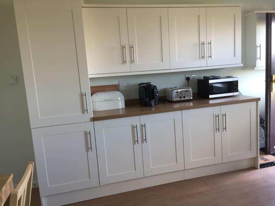 Self Catering house with lovely sea views, 44 Back view 5