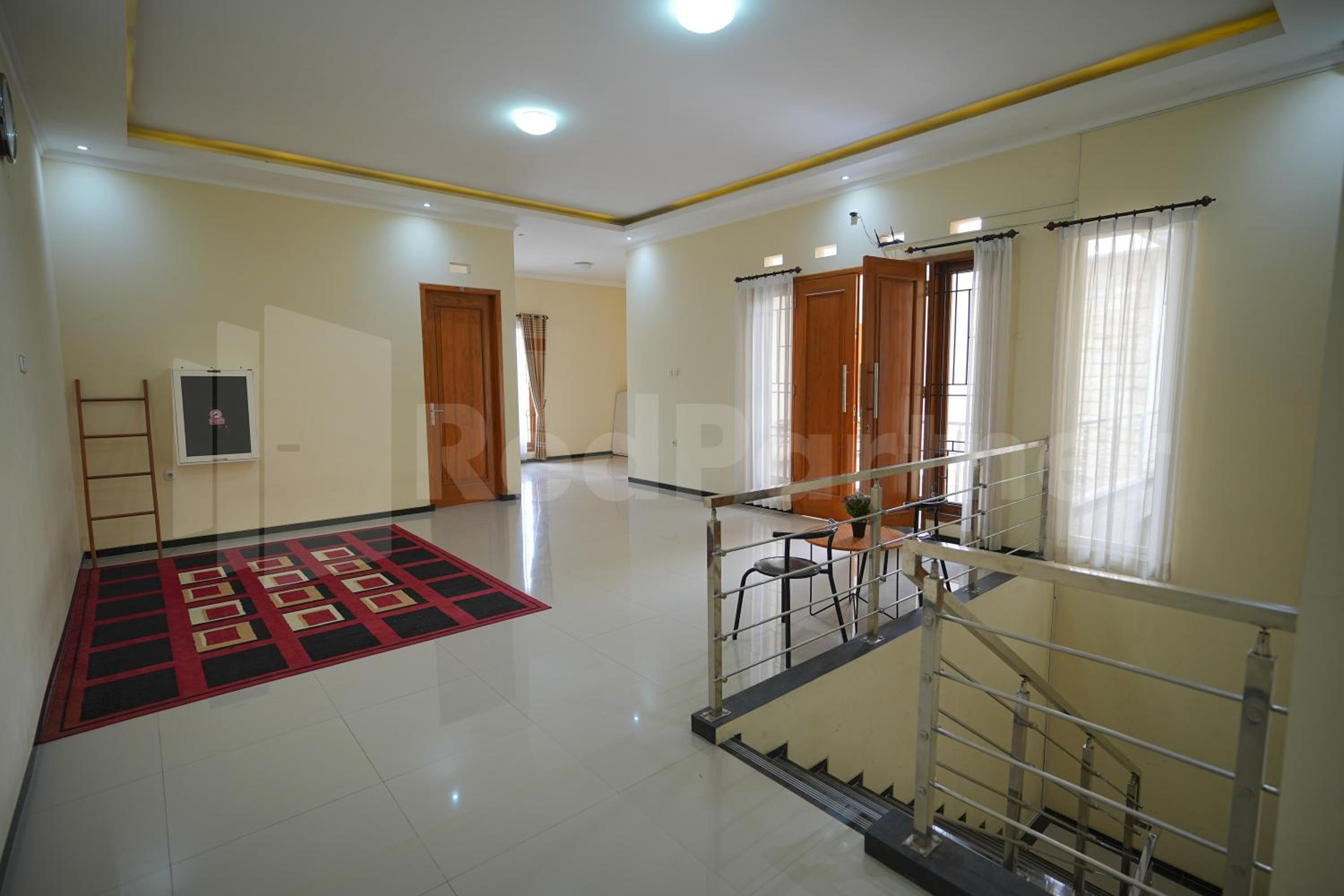 One & Quin Guest House Syariah Mitra RedDoorz view 5