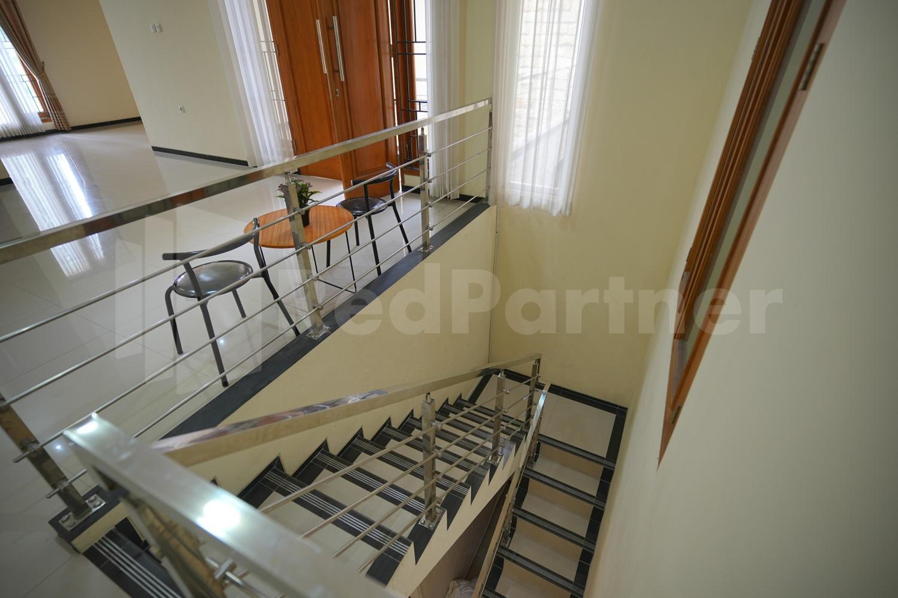 One & Quin Guest House Syariah Mitra RedDoorz view 4