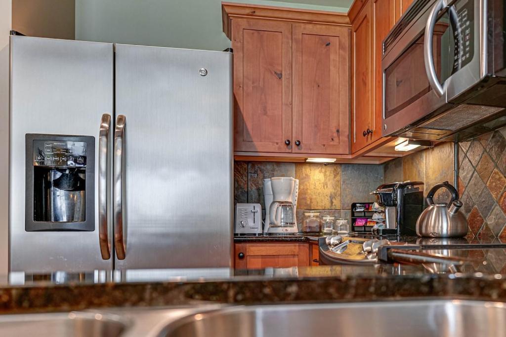 Large Studio Condo with Full Kitchen, Ski, Bike, Beautiful Balcony Views Hottub Fireplace view 4