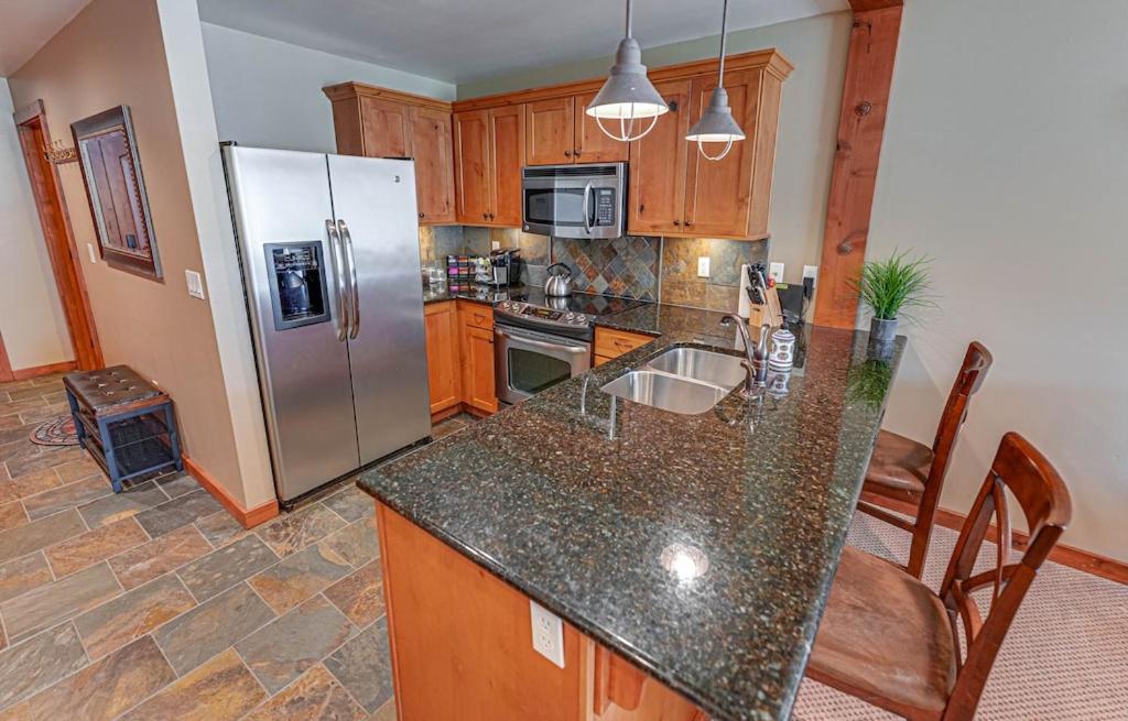 Large Studio Condo with Full Kitchen, Ski, Bike, Beautiful Balcony Views Hottub Fireplace view 3