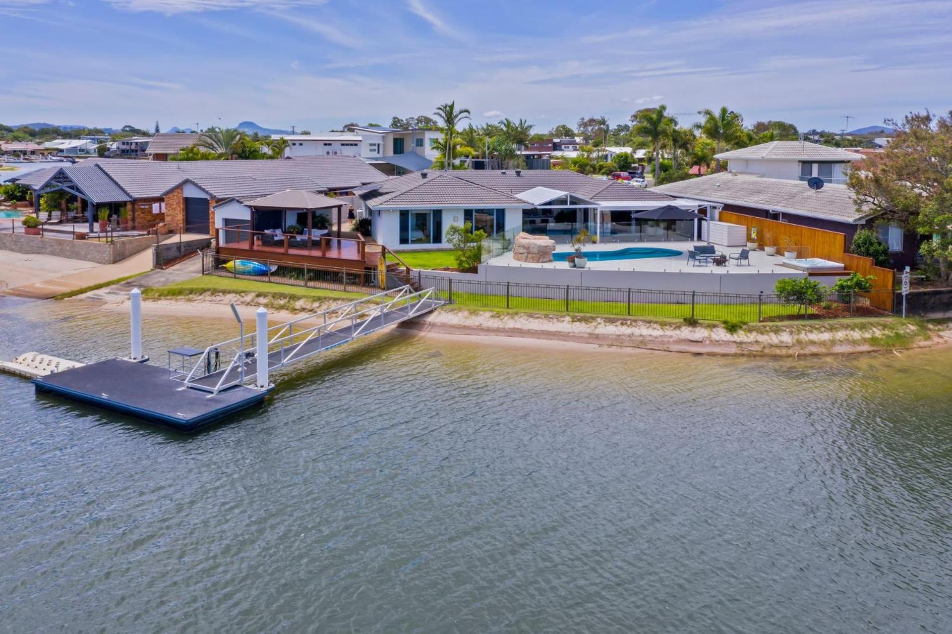 4 bedroom with large water frontage and pool, reverse air conditioning