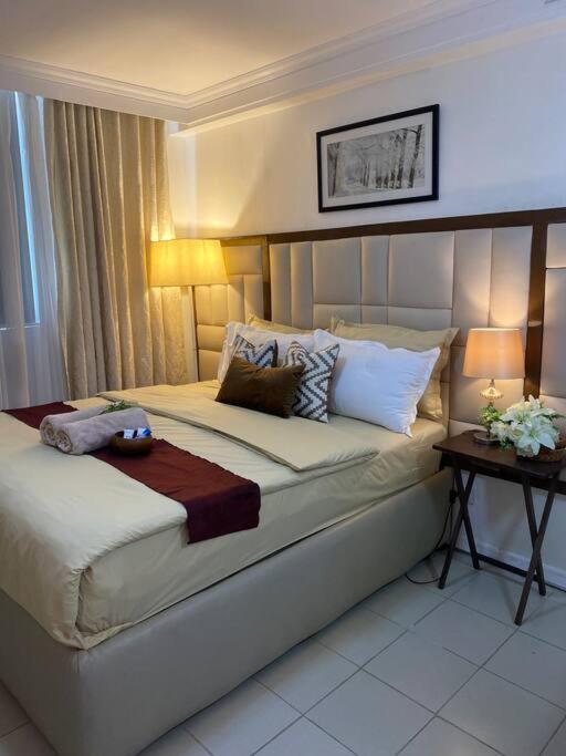 Attractive studio with Luxury bed Good for 1-4pax High speed WiFi with Netflix Free Pool & Parking