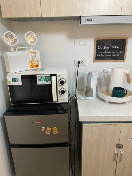 Attractive studio with Luxury bed Good for 1-4pax High speed WiFi with Netflix Free Pool & Parking