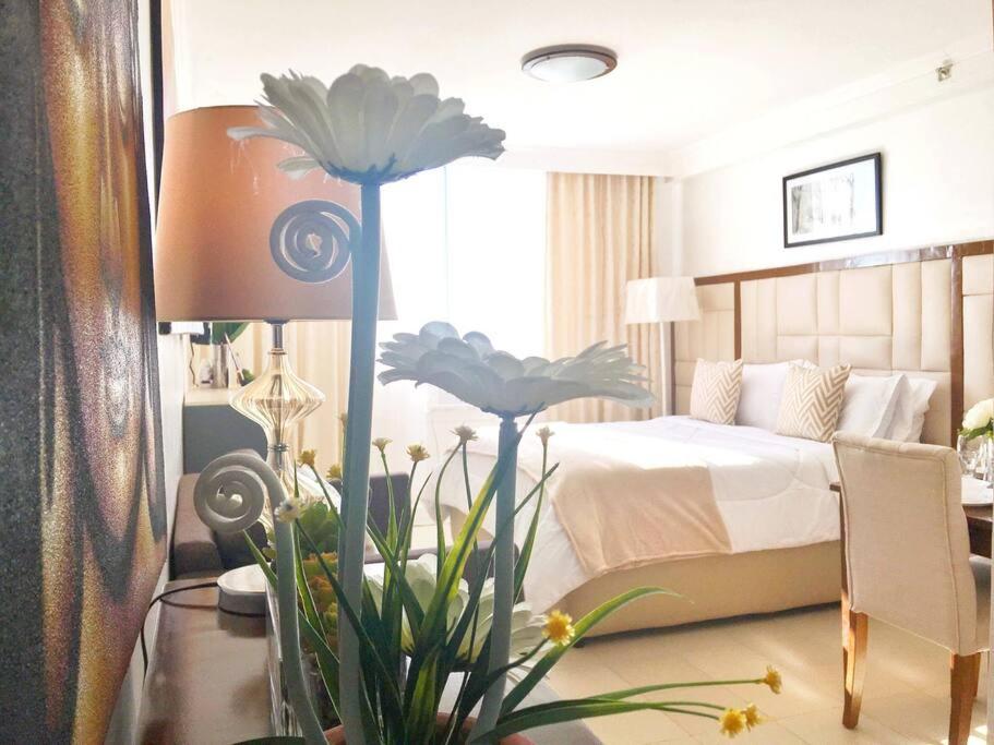 Attractive studio with Luxury bed Good for 1-4pax High speed WiFi with Netflix Free Pool & Parking