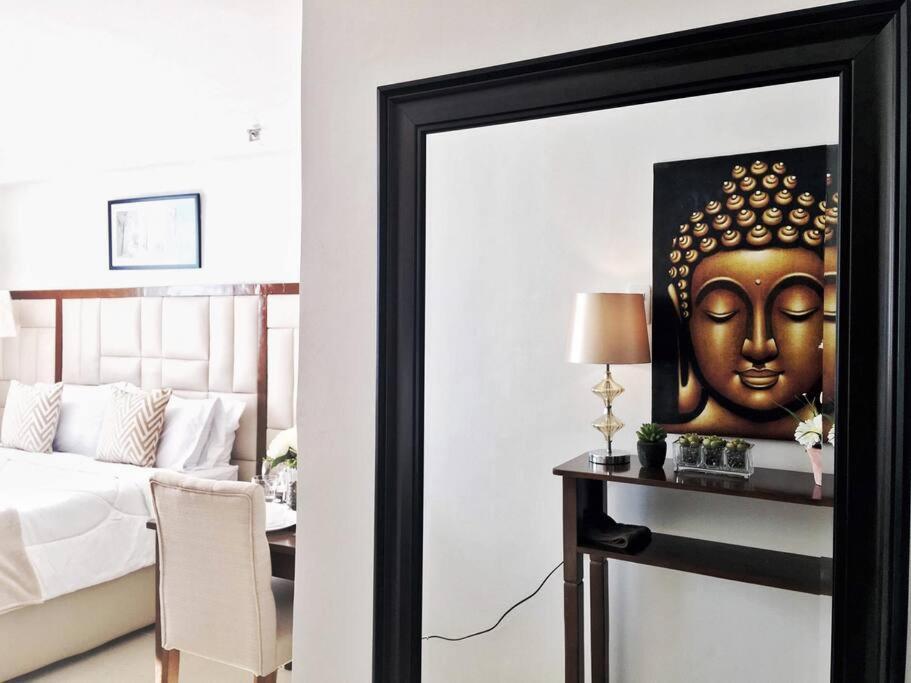 Attractive studio with Luxury bed Good for 1-4pax High speed WiFi with Netflix Free Pool & Parking