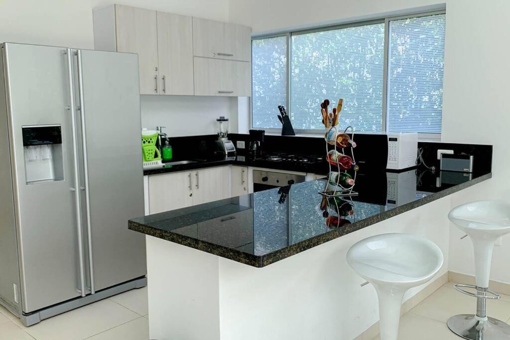 Condo Apulo - Hermosa casa - Jacuzzi y Piscina privados - WiFi