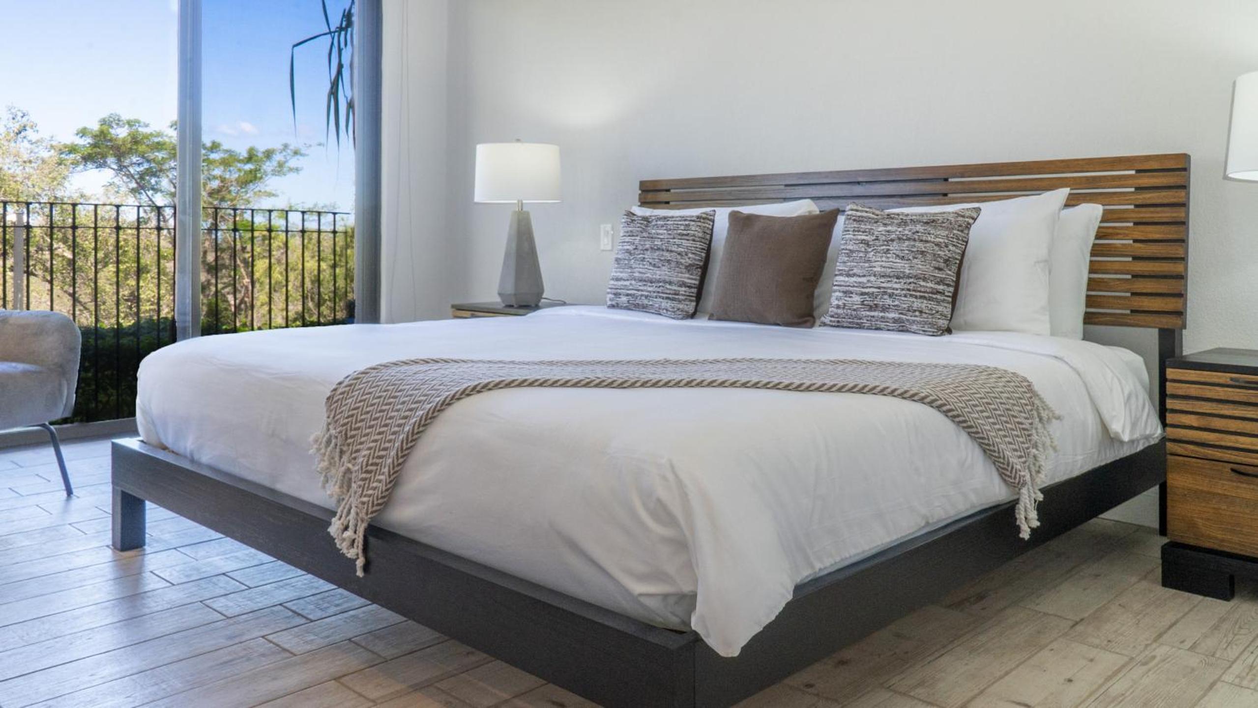 Bright 2BR Condo with Partial Ocean View - Bougainvillea - Reserva Conchal