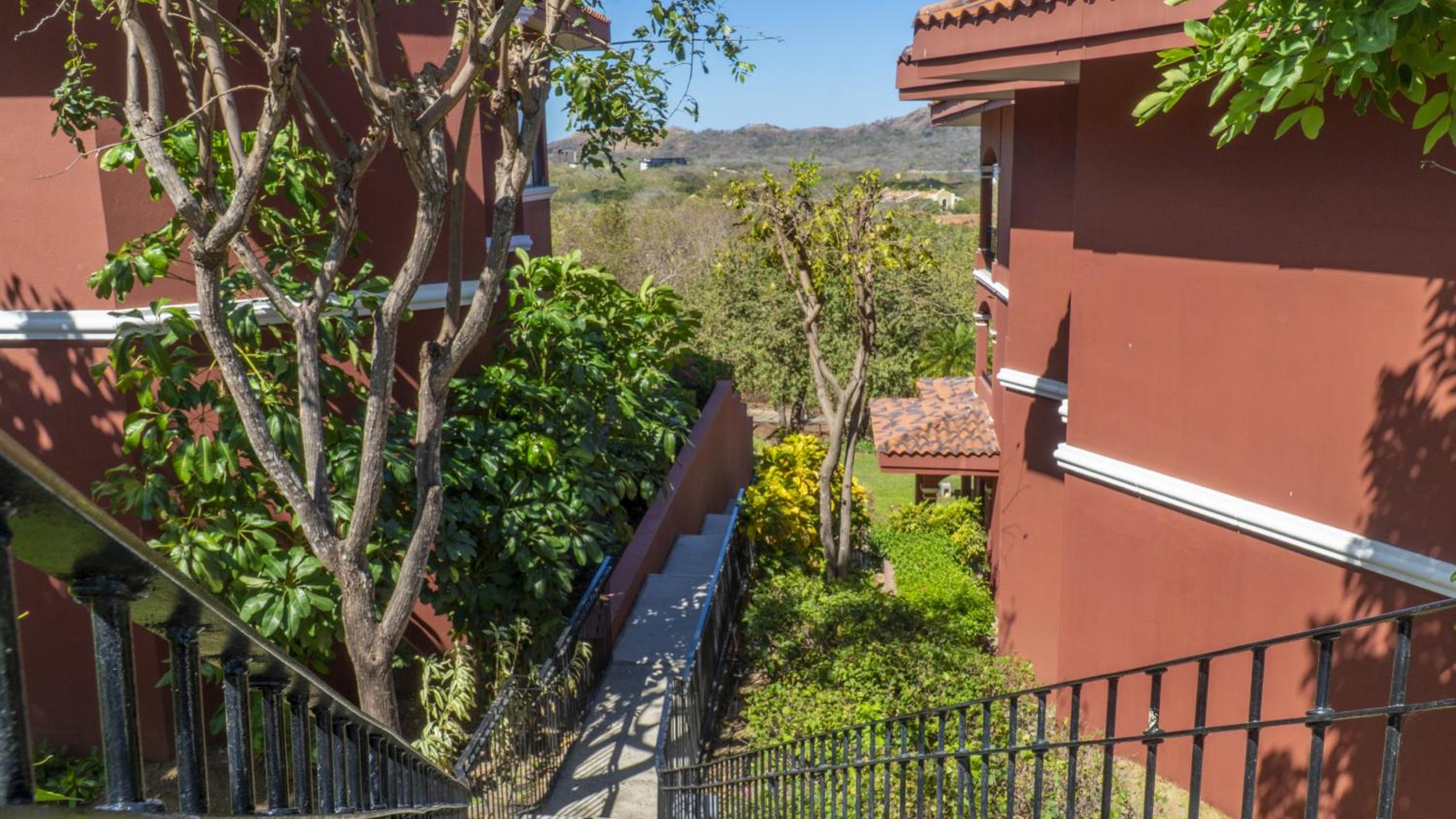 Bright 2BR Condo with Partial Ocean View - Bougainvillea - Reserva Conchal