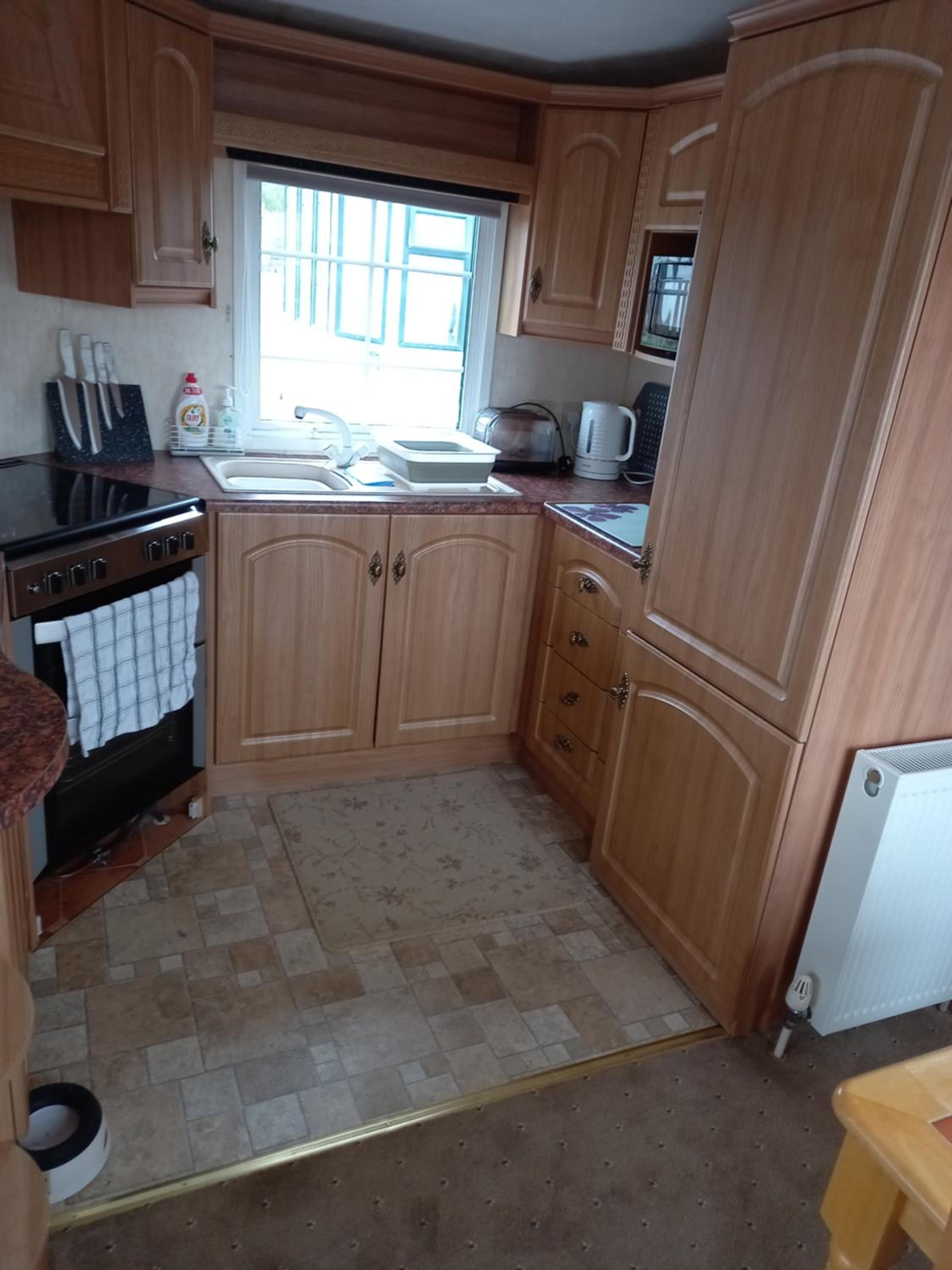 Adorable Caravan in Western Lakes view 3