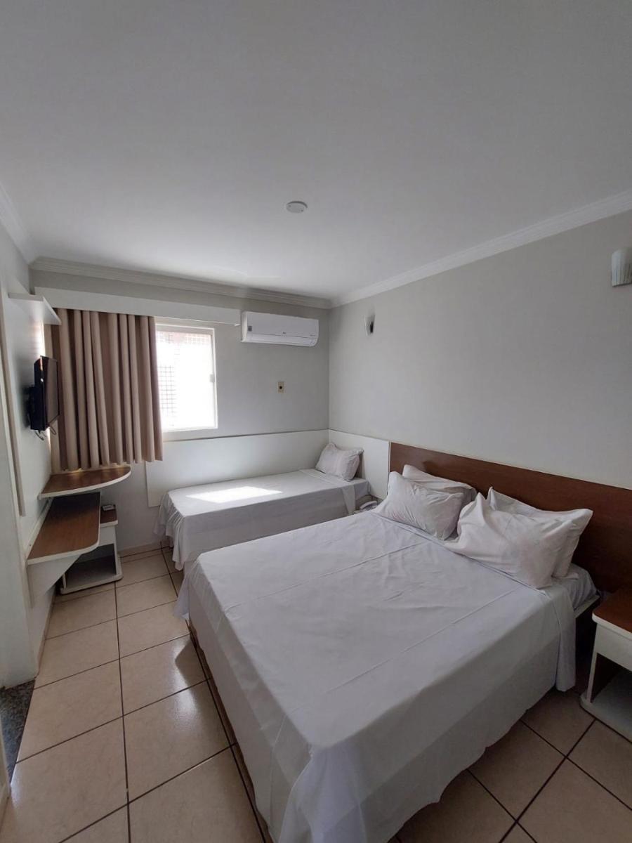 diRoma Fiori 89 com roupa de cama e banho.