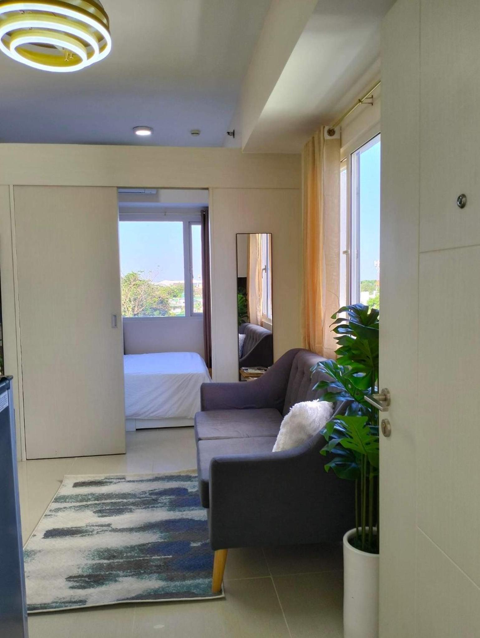 Cozy 2BR corner unit in a prime location, your perfect city home view 5