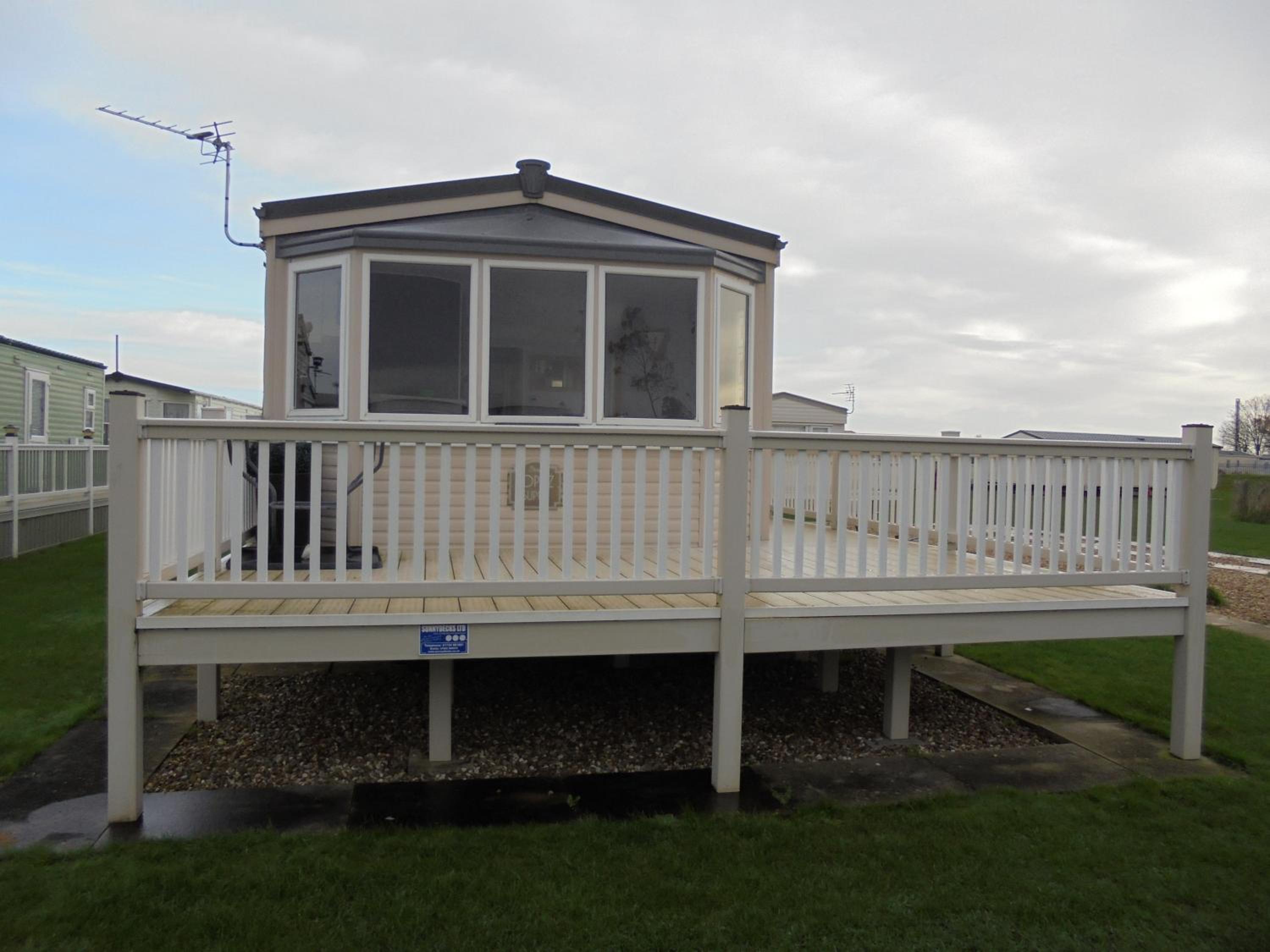 The Chase Topaz Super 4 Berth panel heated Wrap around veranda view 3