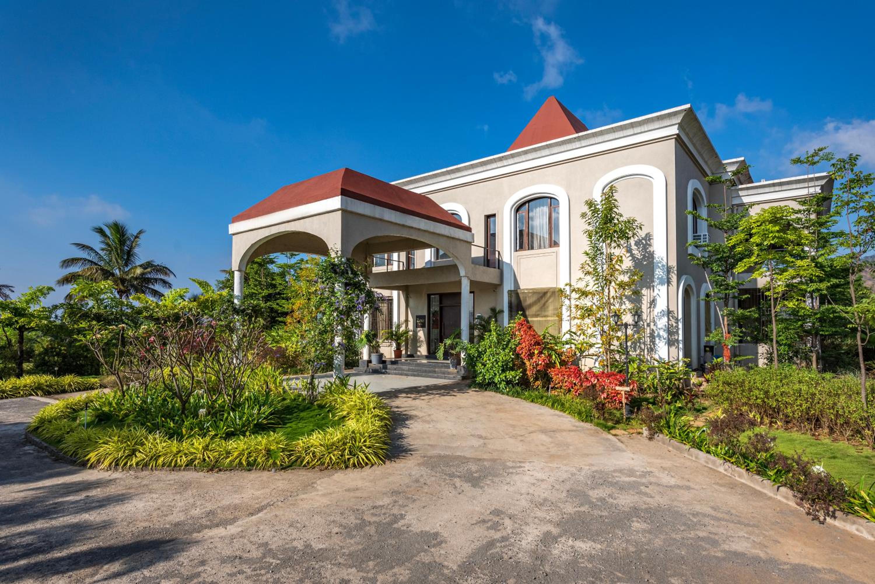 SaffronStays Zuma Villa - 7BR pet-friendly villa with heated pool, 6000 sqft lawn, play zone & cards room near Pawna Dam view 3