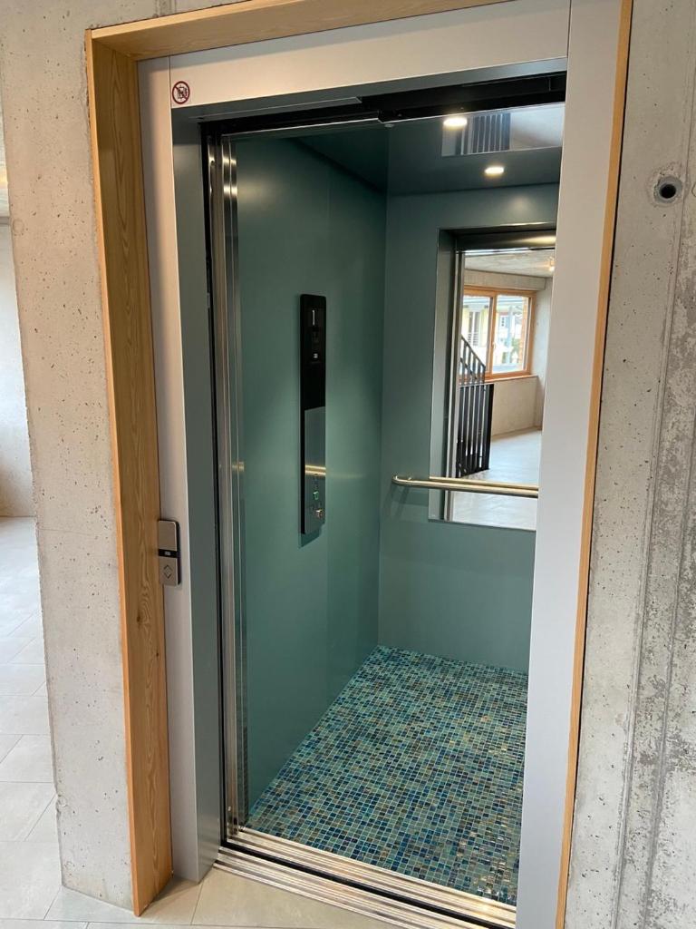 BOUTIQUE APARTMENTS LUSTENAU Nachhaltige Kühlung über Erdsonde und Fussbodenkühlung