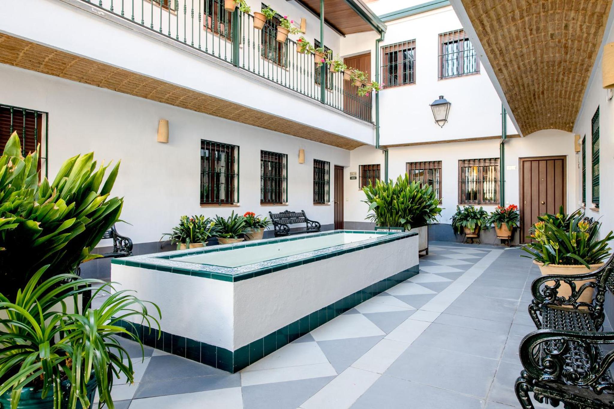 Triana Boutique Apartments by Hommyhome