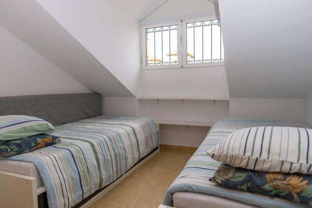 Beautiful 3 Bed Townhouse with landscaped communal pool area