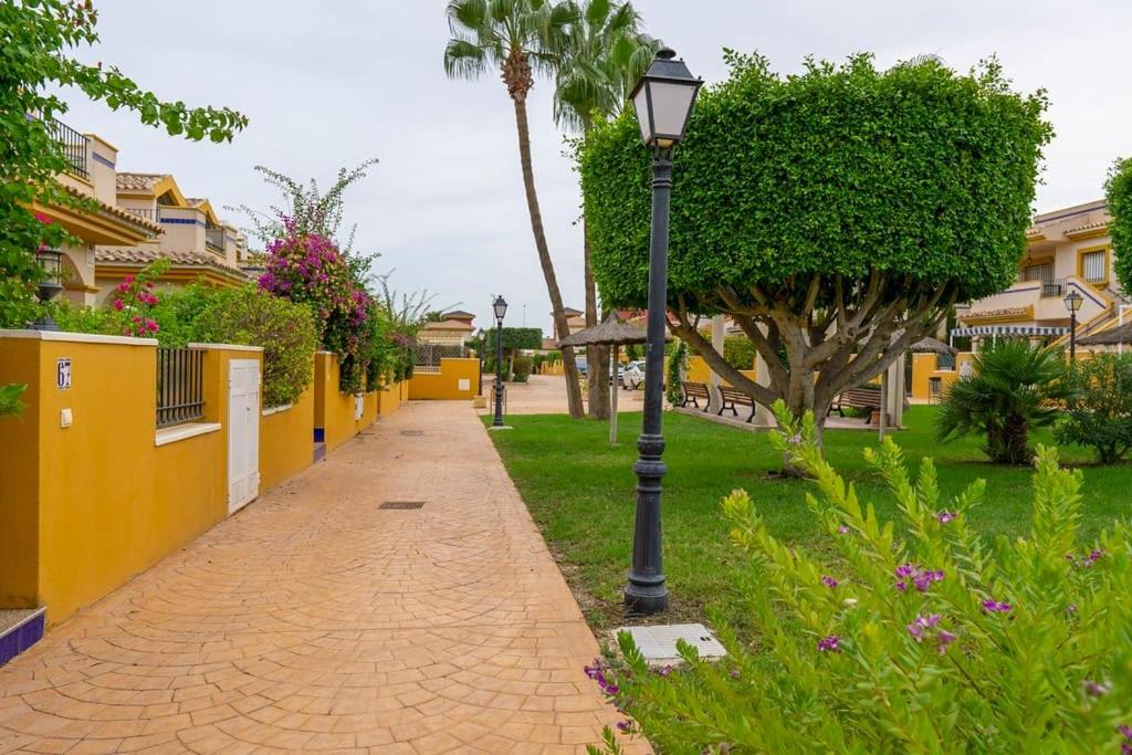 Beautiful 3 Bed Townhouse with landscaped communal pool area