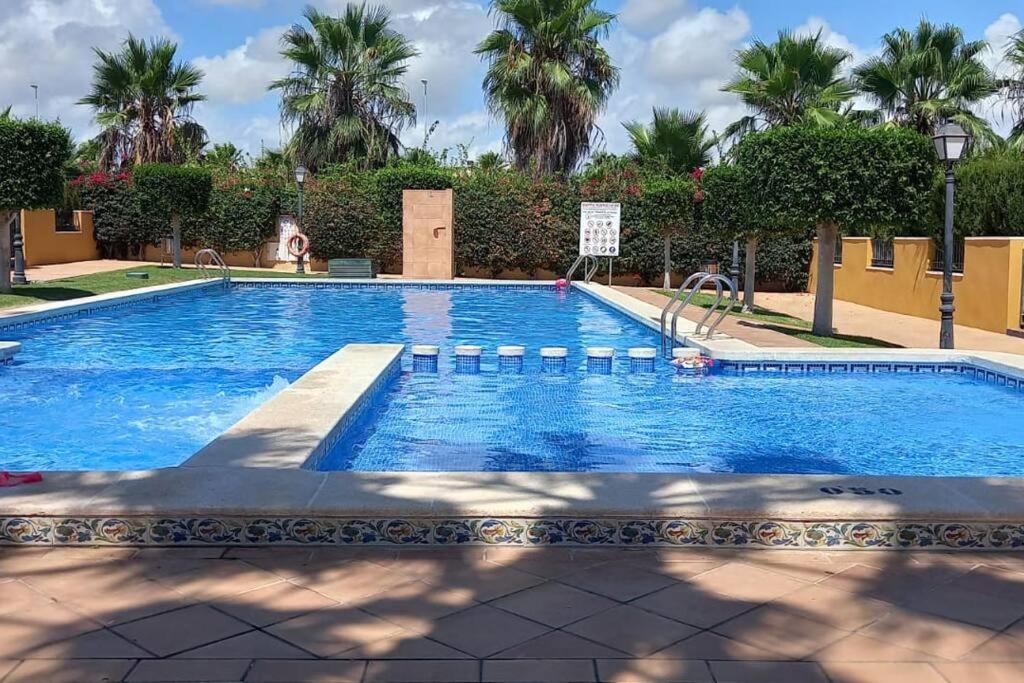 Beautiful 3 Bed Townhouse with landscaped communal pool area