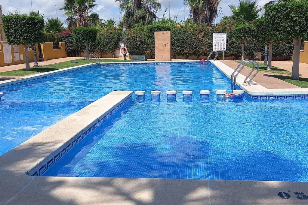 Beautiful 3 Bed Townhouse with landscaped communal pool area