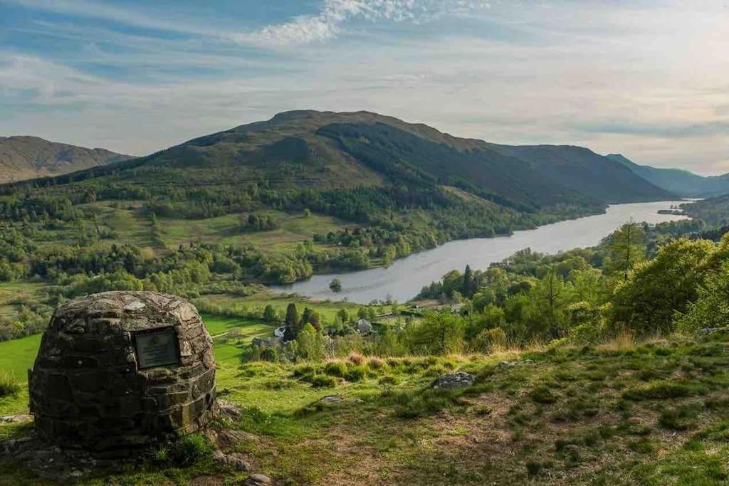 Sleeps 10. The Old pink library by loch and river view 2