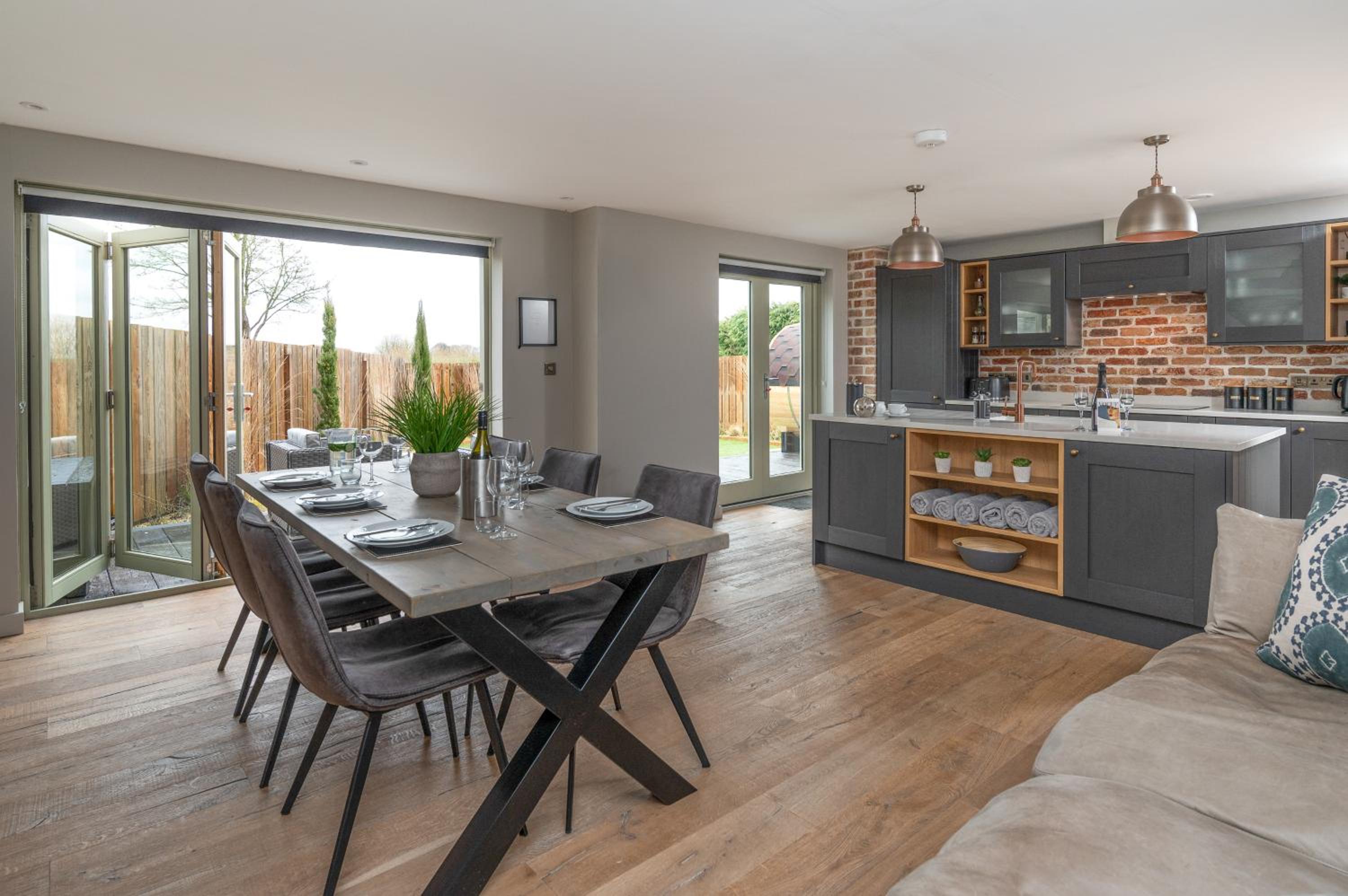 Designer Cotswold post house with external sauna view 4