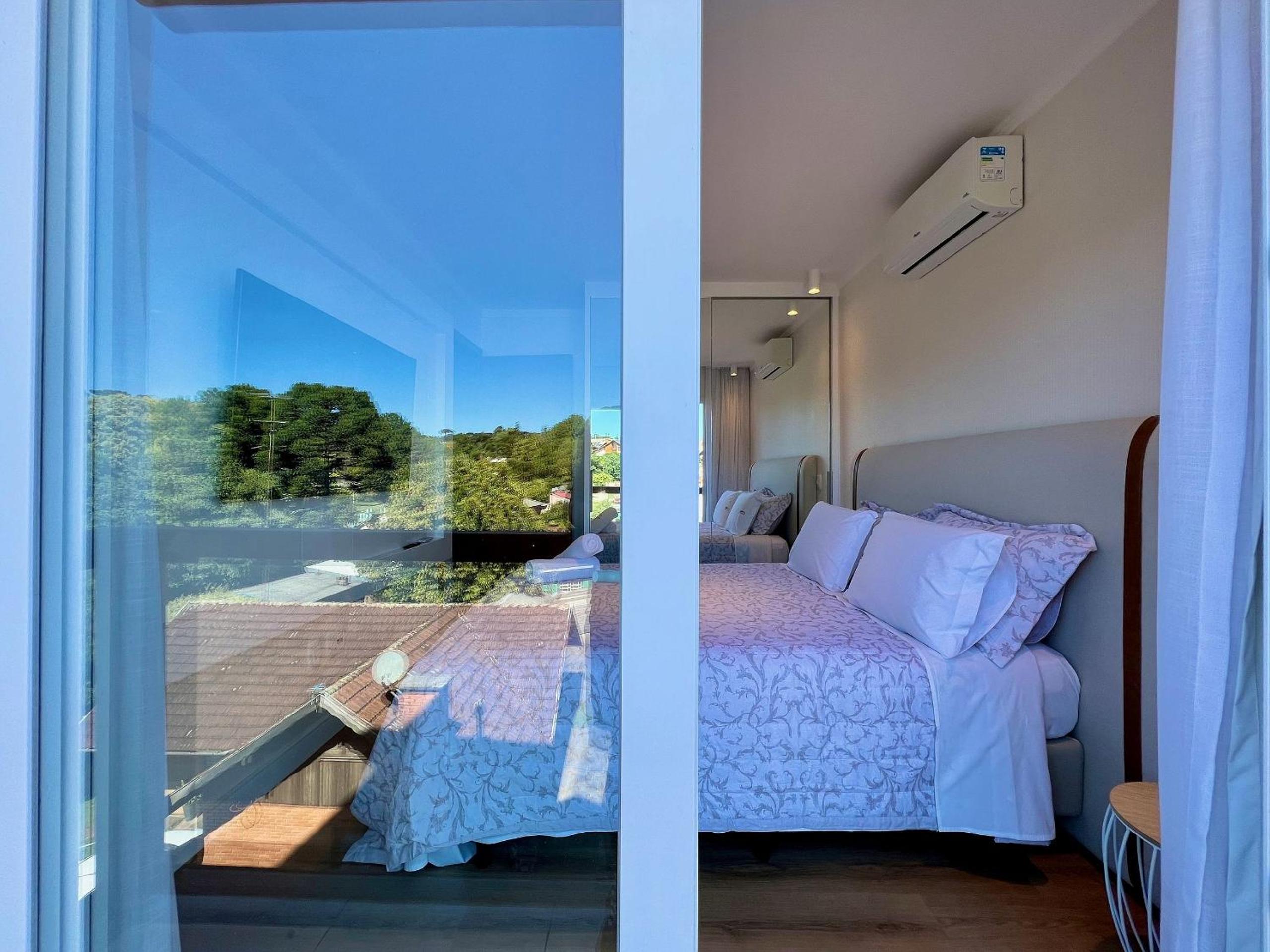 Apartamentos Rossa Residenzialle CENTRO by Achei Gramado