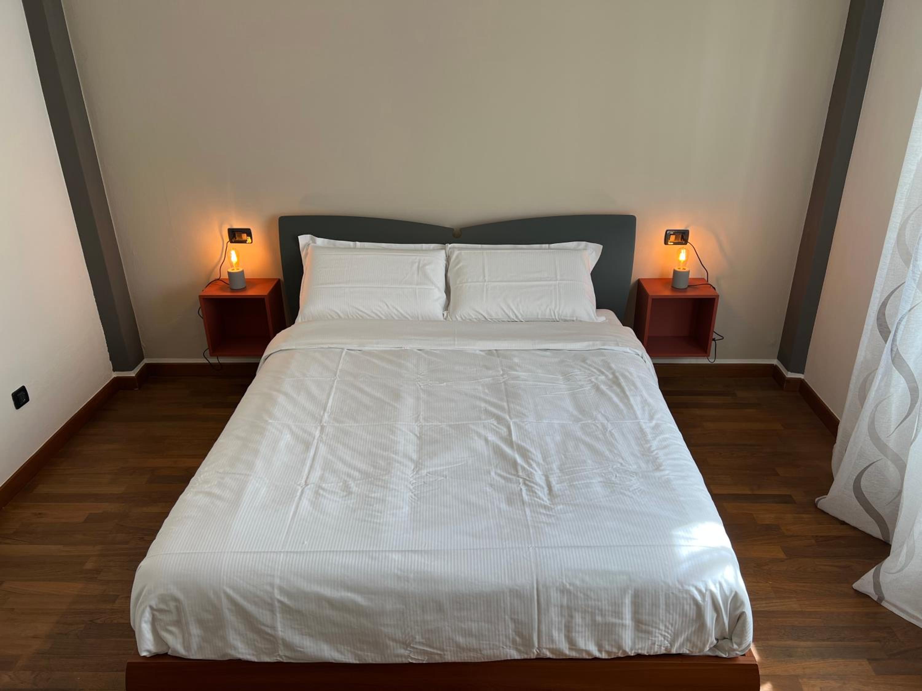 Relax Segrate en Segrate — bedroom