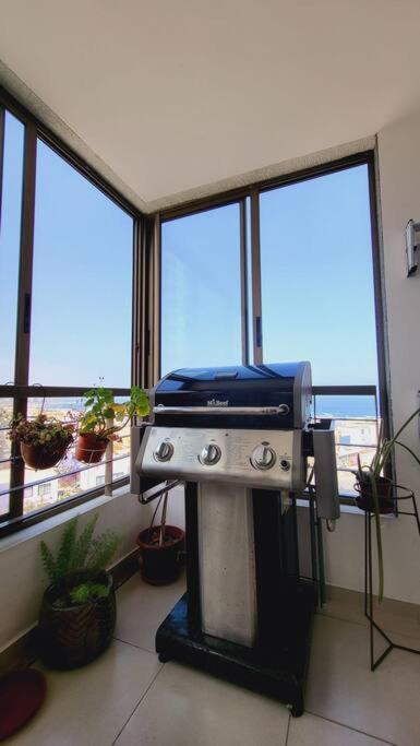 Departamento de Lujo con Terraza y Vista al Mar