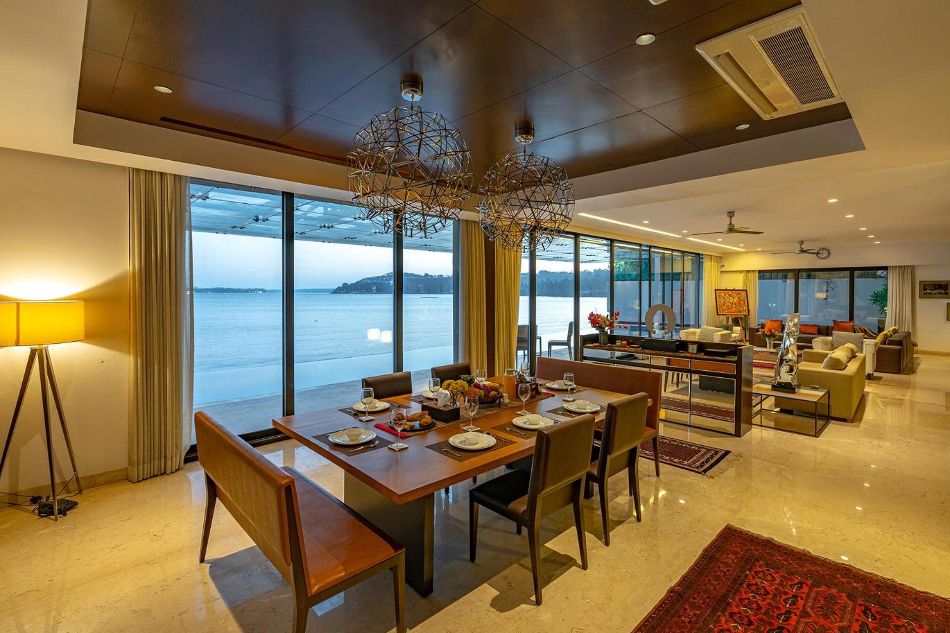 Oceanic Sunsets with River View, Comp Breakfast & Infinity Pool at StayVista view 5