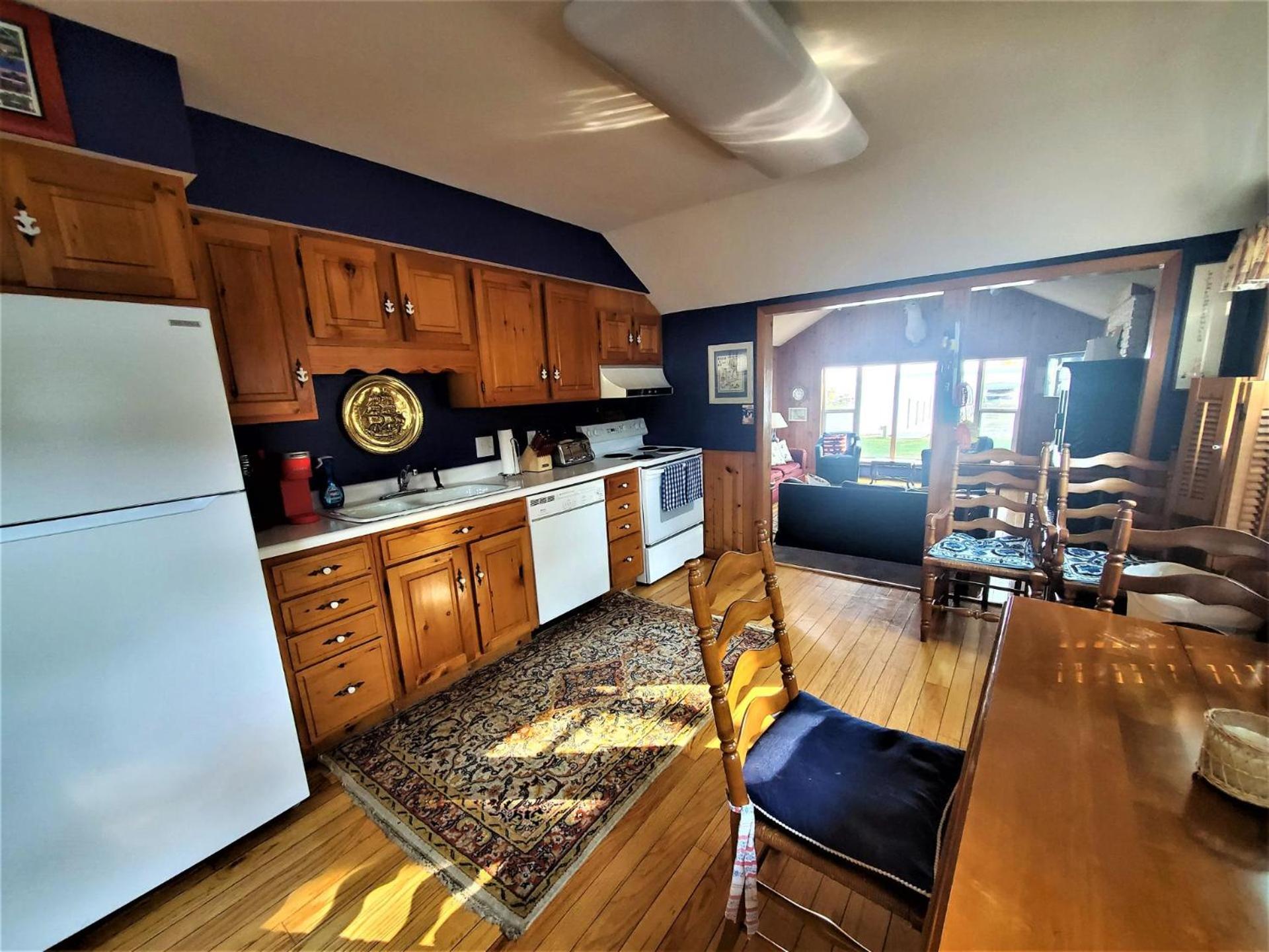 Classic West Lake Okoboji Estate w/ Guest House + Sand Beach