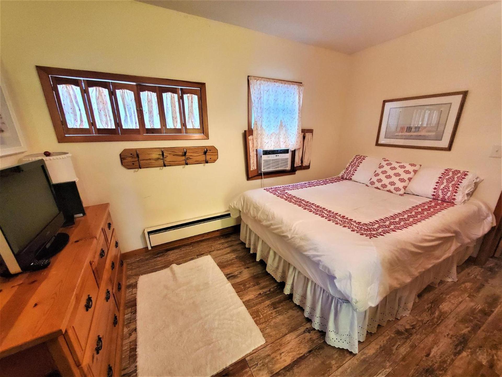 Classic West Lake Okoboji Estate w/ Guest House + Sand Beach