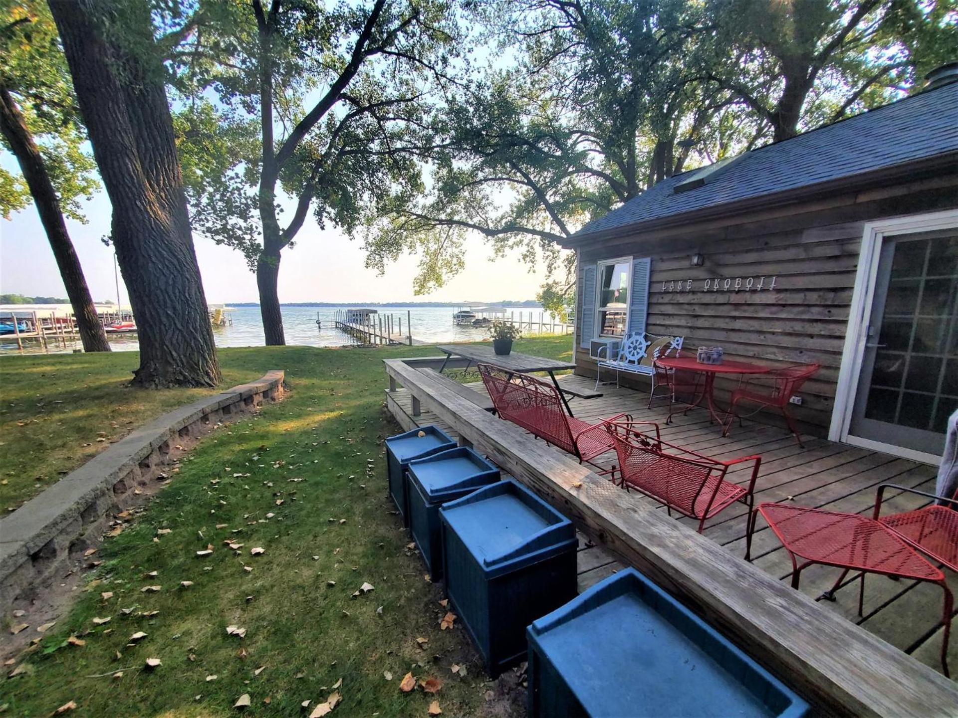 Classic West Lake Okoboji Estate w/ Guest House + Sand Beach