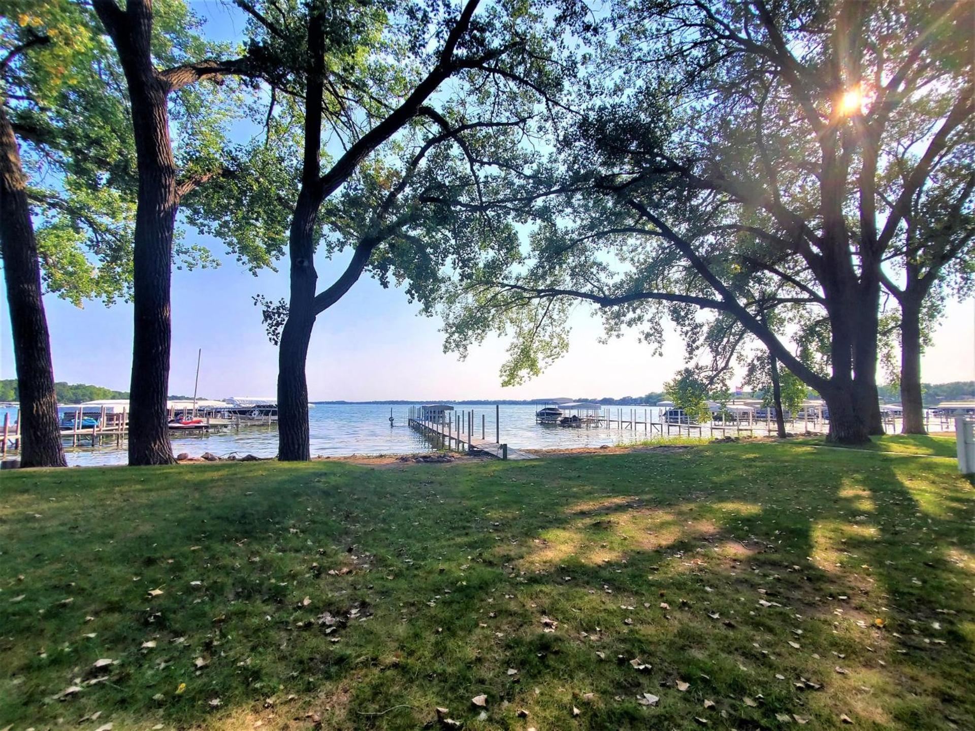 Classic West Lake Okoboji Estate w/ Guest House + Sand Beach
